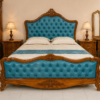 Modern Luxury wooden bed with blue tufted upholstery, antique carved headboard, premium classic bedroom furniture design for elegant interiors.