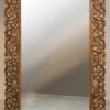 Carved Wooden frames for Wall with floral vine patterns and gold-painted accents on a marble floor background.