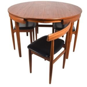 Wooden dinning table “Modern round solid wood dining table set with four chairs, featuring a foldable design and premium finish for compact and stylish dining spaces”
