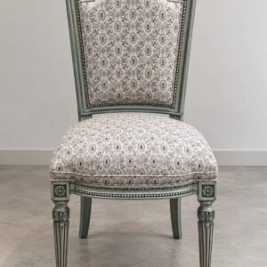 website upload Luxury French Classic Upholstered Dining Chair with carved solid wood frame, premium patterned fabric upholstery, fluted legs, and handcrafted luxury finish by The Wooden Atelier.