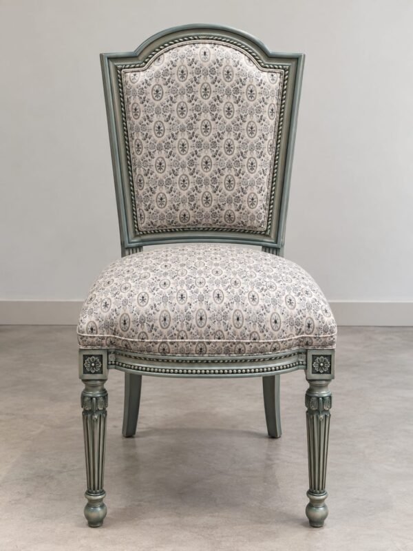 website upload Luxury French Classic Upholstered Dining Chair with carved solid wood frame, premium patterned fabric upholstery, fluted legs, and handcrafted luxury finish by The Wooden Atelier.